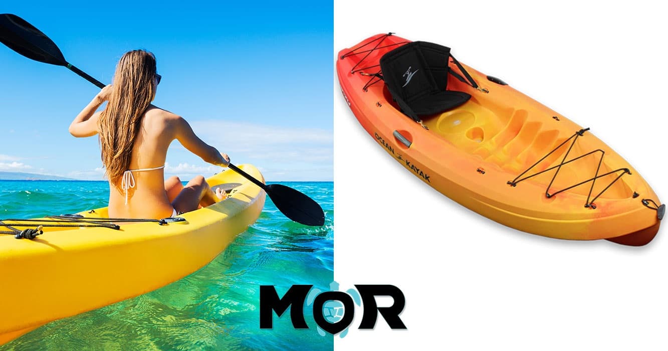 Solo kayaker paddling turquoise Hawaiian coastal waters
