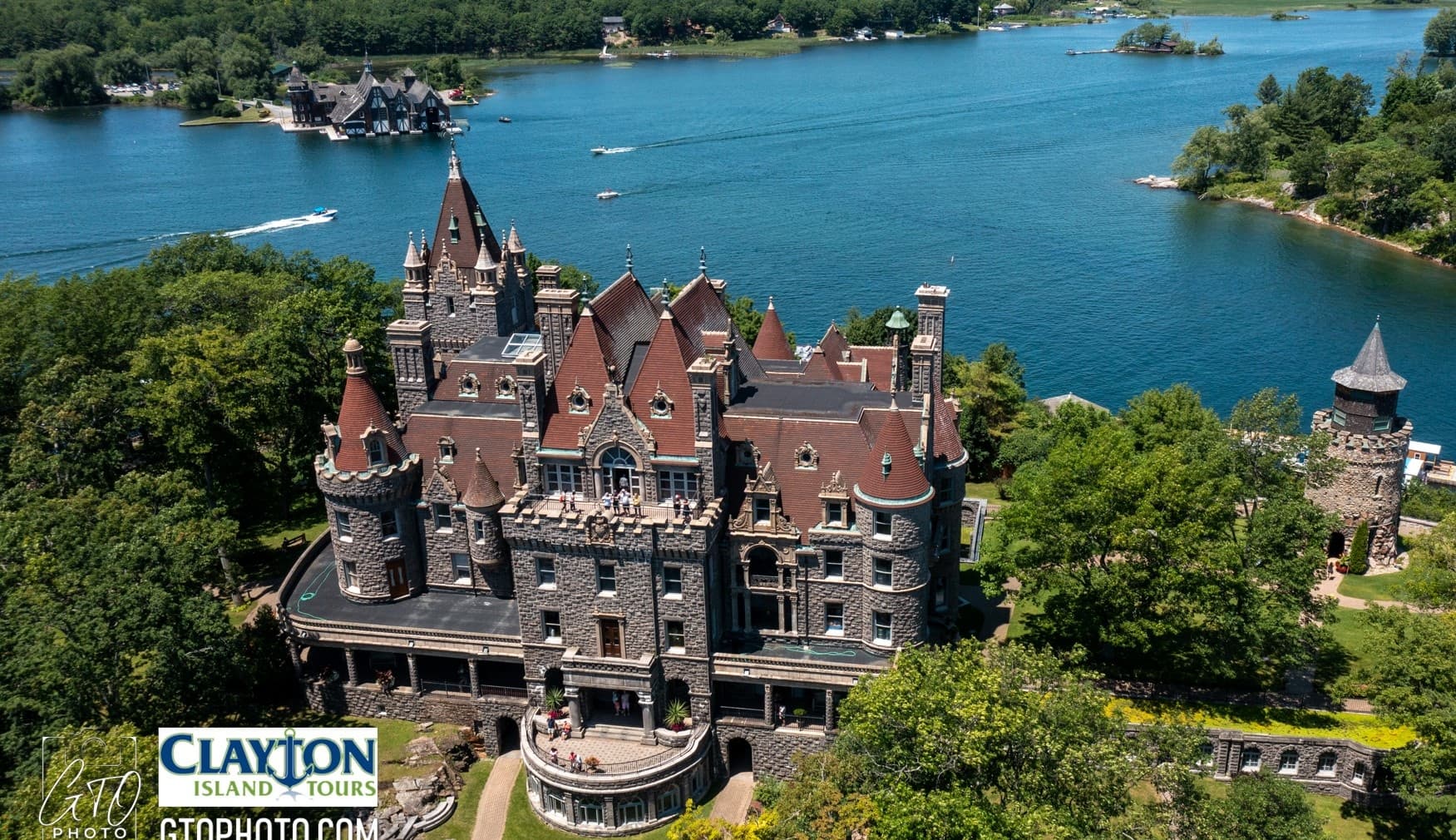 Panoramic aerial of island castle and docks in the St Lawrence River