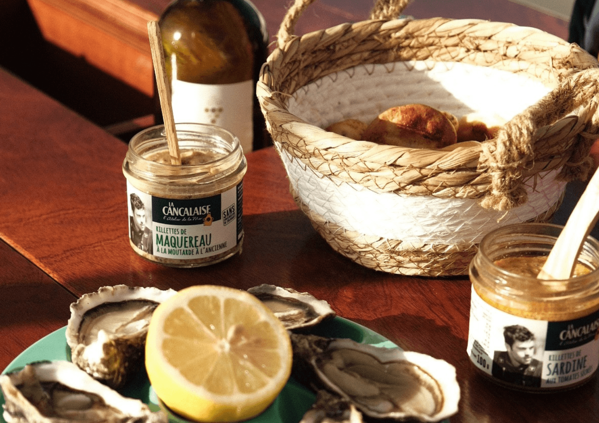 Platter of fresh oysters with lemon and local jarred condiments