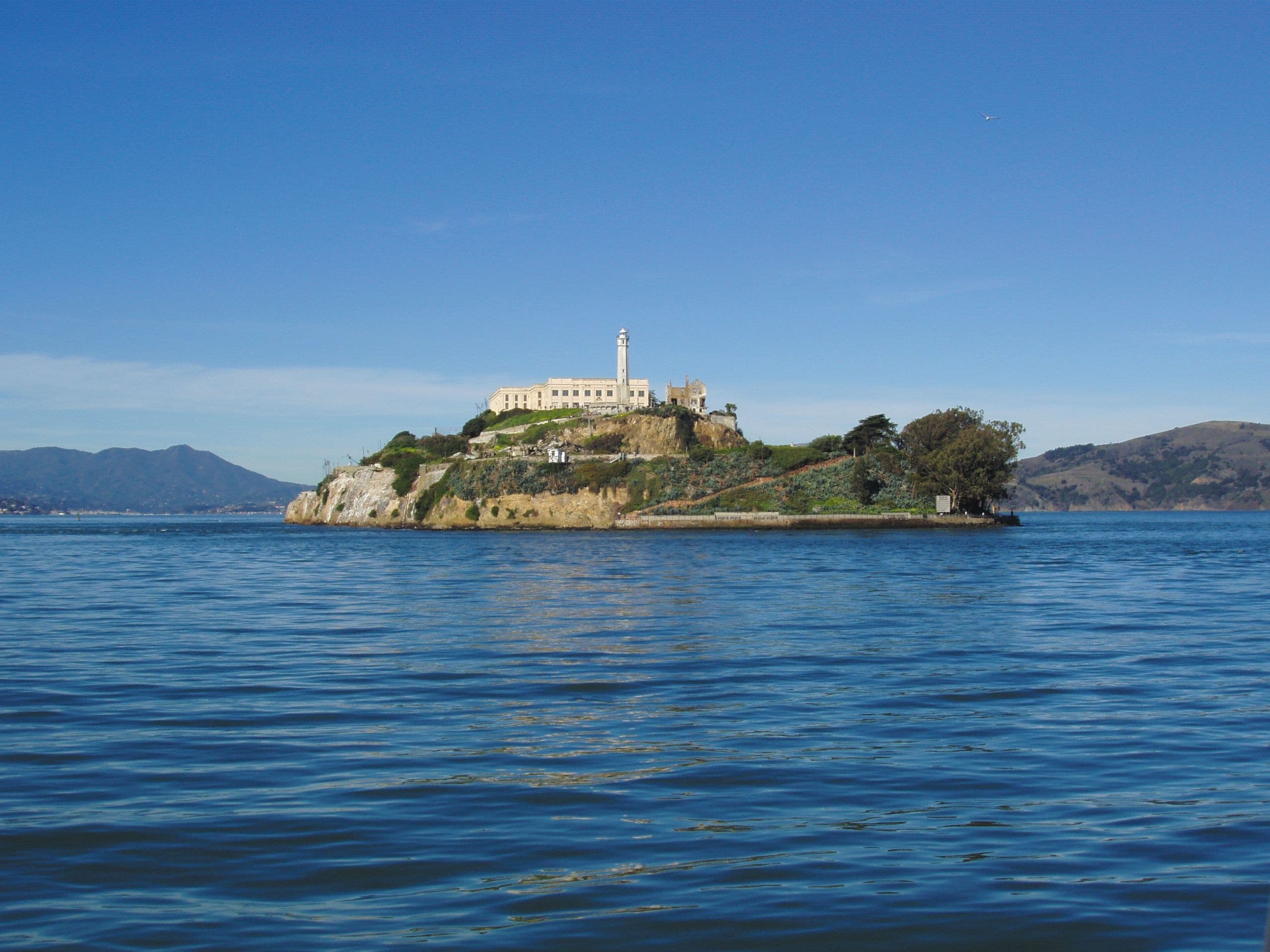 Scenic Alcatraz Island in San Francisco Bay with clear blue sky