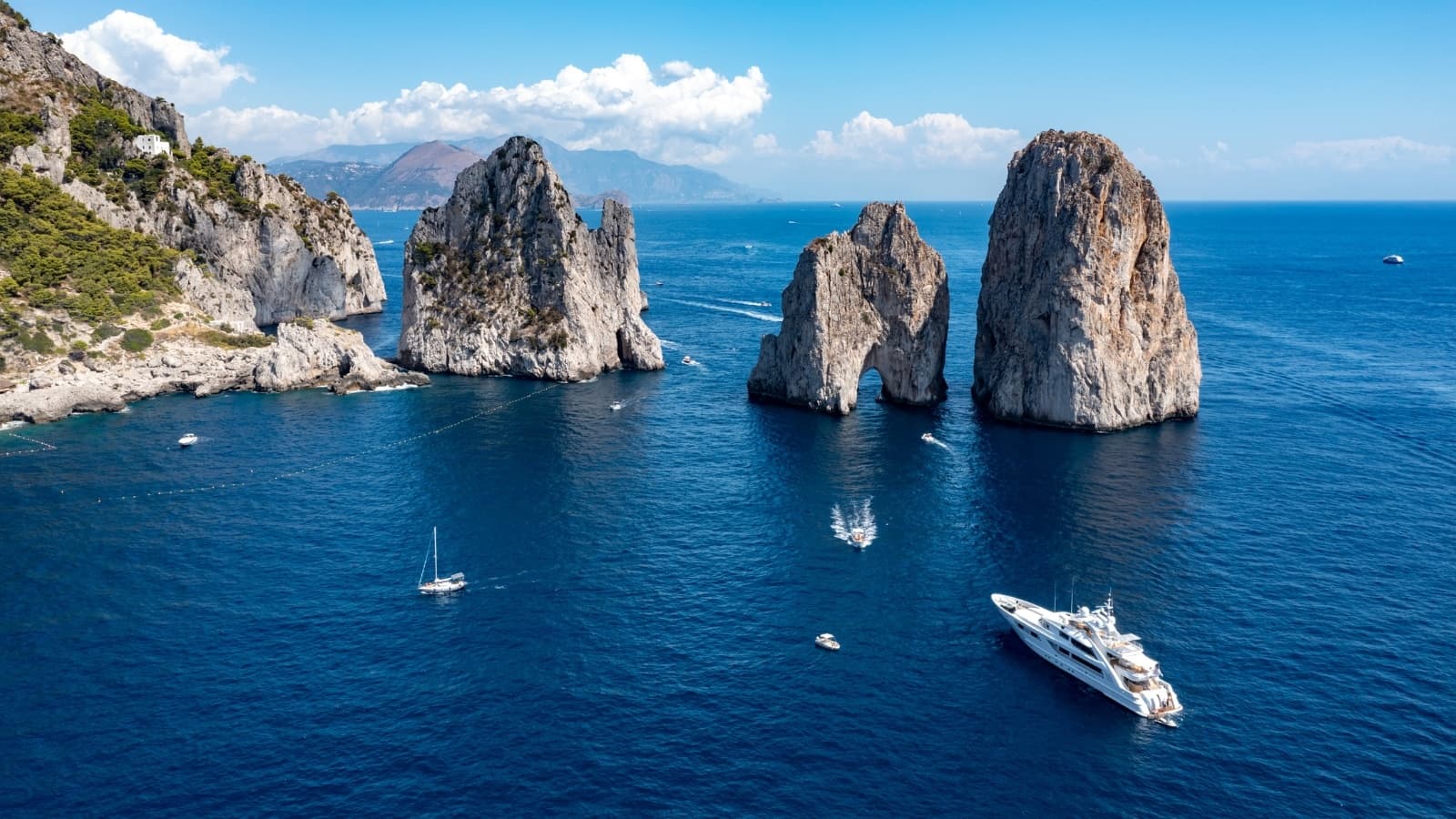 Sunset Cruise & Faraglioni Tour with CP Charter in Campania