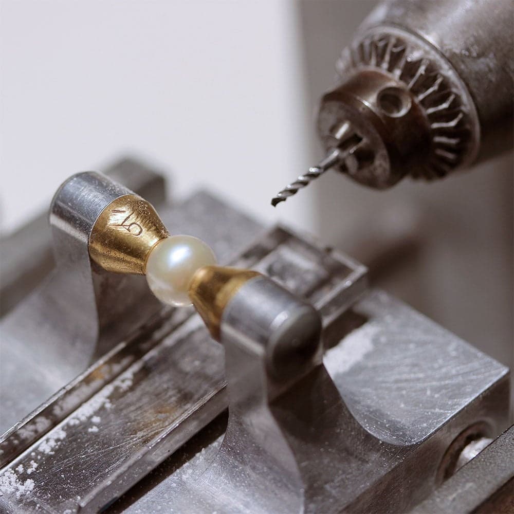Close-up of pearl drilling tool in jewelry workshop, Tenerife