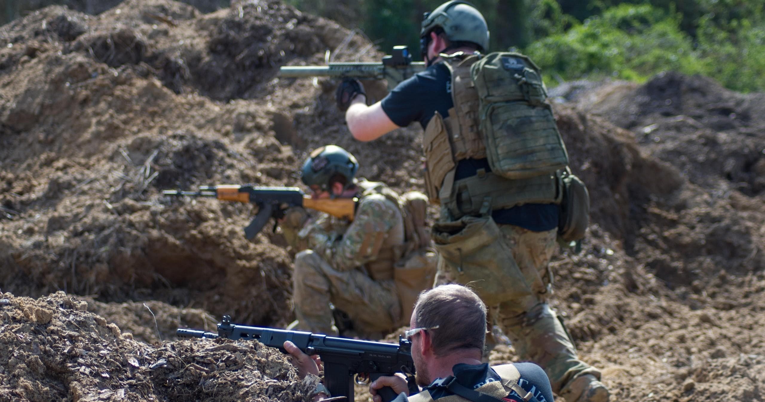 Tactical players advancing through grassy field in match
