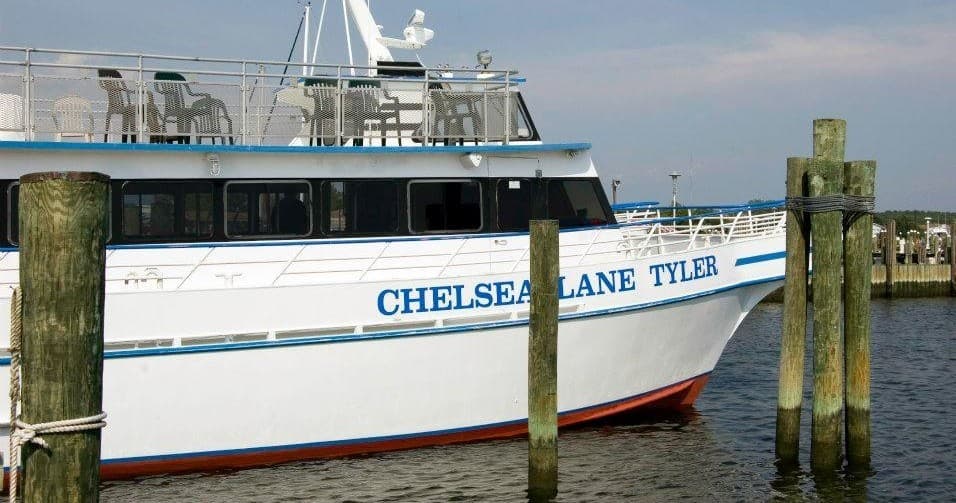 Close-up of Smith Island cruise vessel tied to wooden pilings