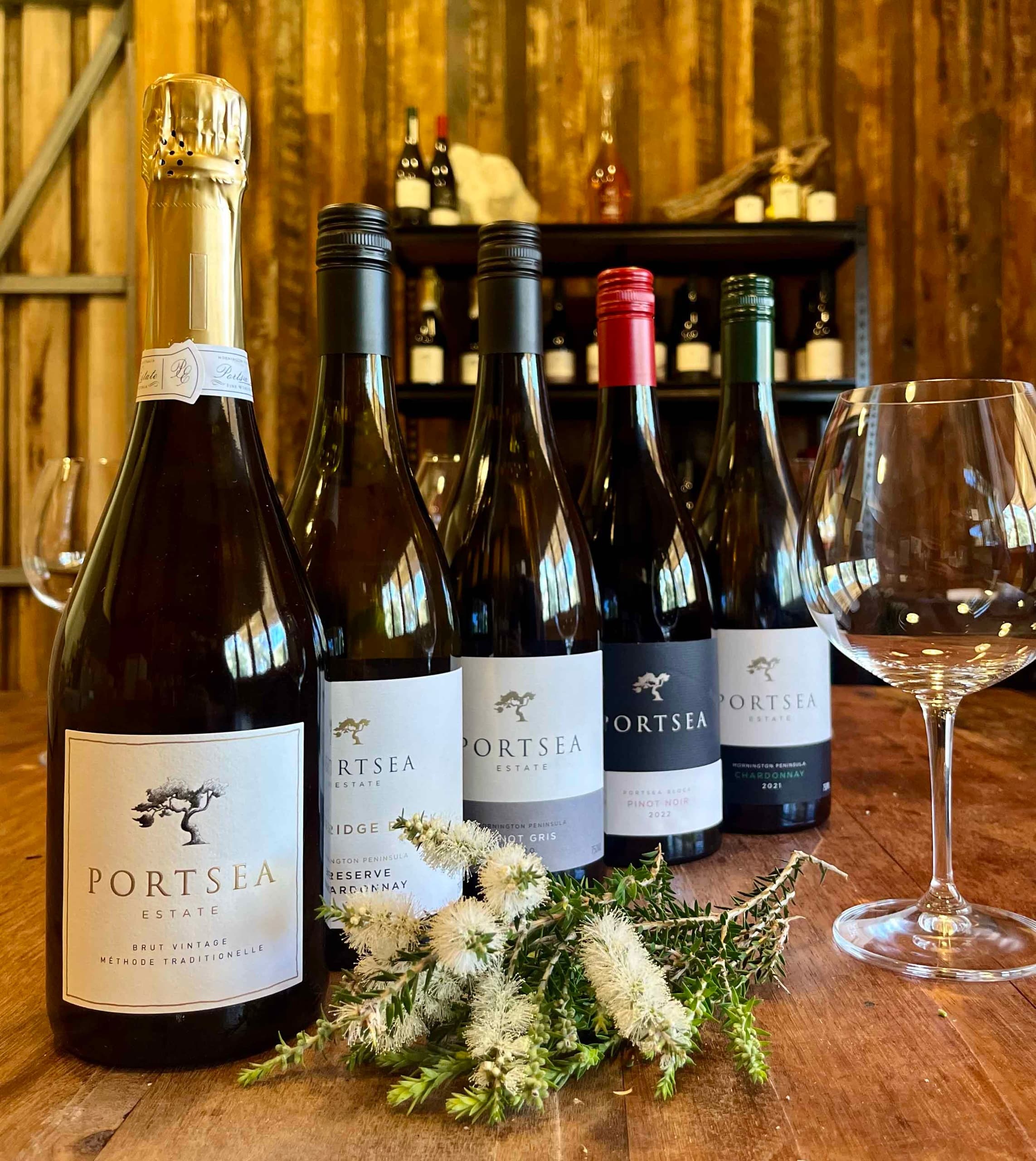 Bottles of Portsea Estate wine displayed indoors for cellar tasting