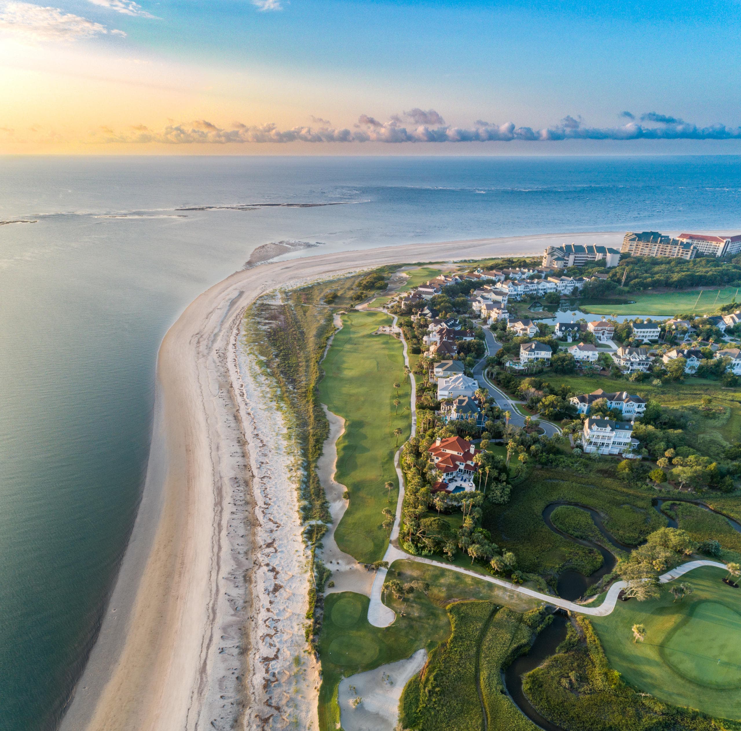Aerial view of coastal barrier island beach and resort shoreline