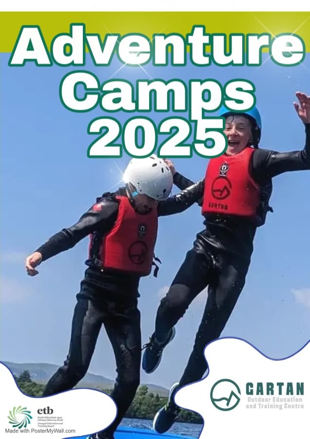 Instructors jumping in wetsuits during coastal adventure training