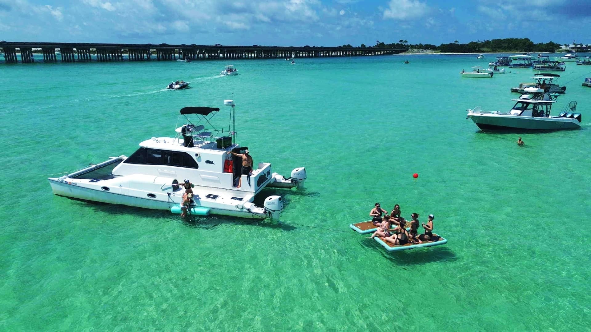 Full-Day Catamaran Charter to Crab Island from Miramar Beach photo 3
