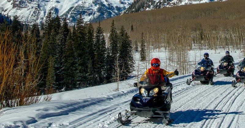 Explore Winter Magic on a Maroon Bells Snowmobile Tour Near Aspen, Colorado