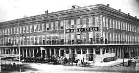 Historic riverside hotel exterior for guided heritage tours