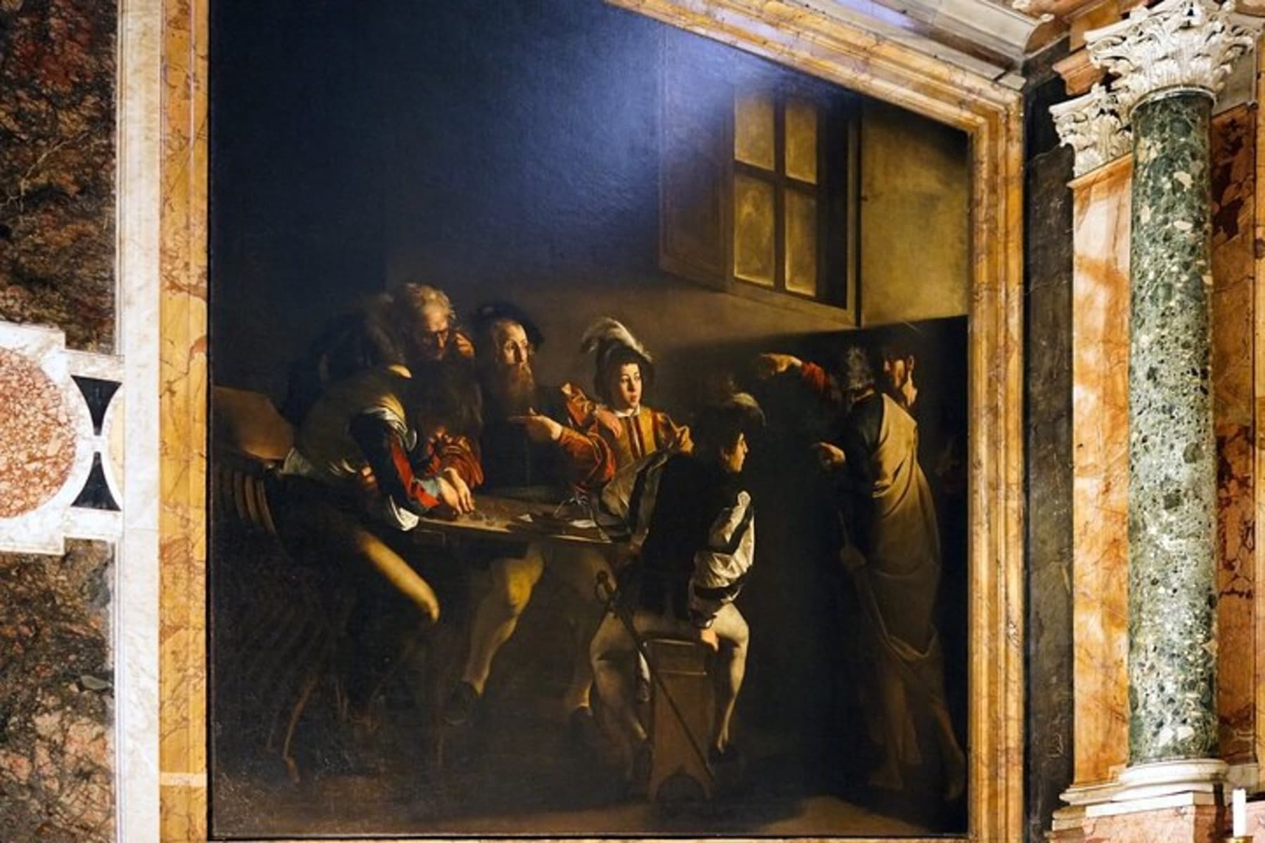 Baroque painting displayed inside ornate museum for guided tours