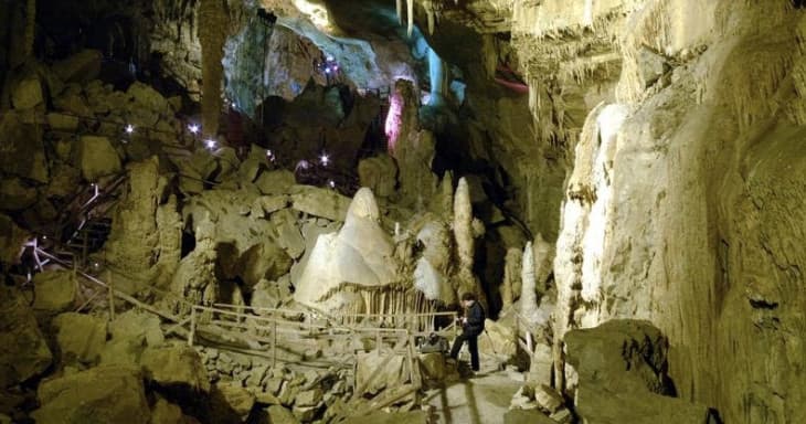Expansive underground cave room at Lost World Caverns tour