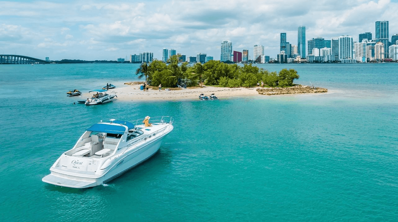 Yacht anchored near small island and turquoise bay scenery