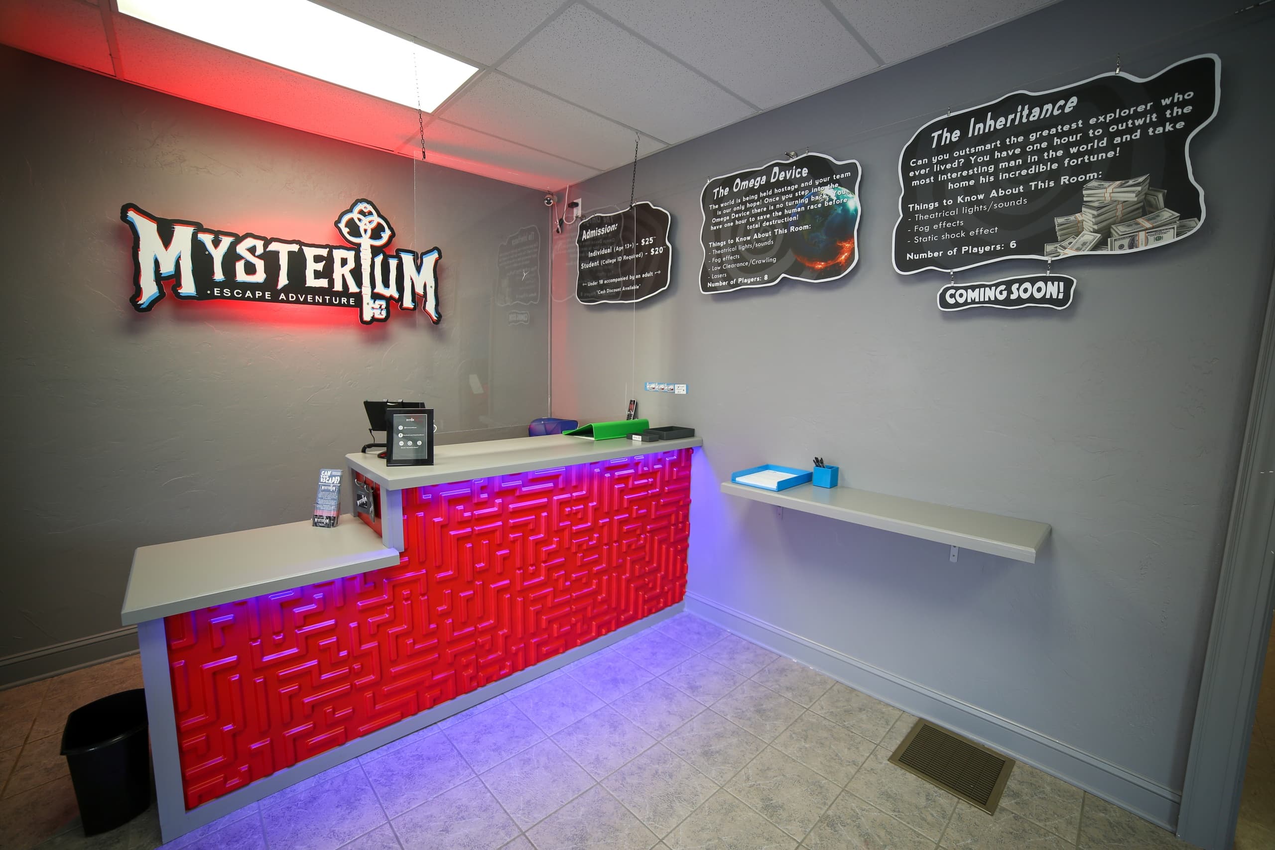 Modern escape room lobby reception with neon lighting