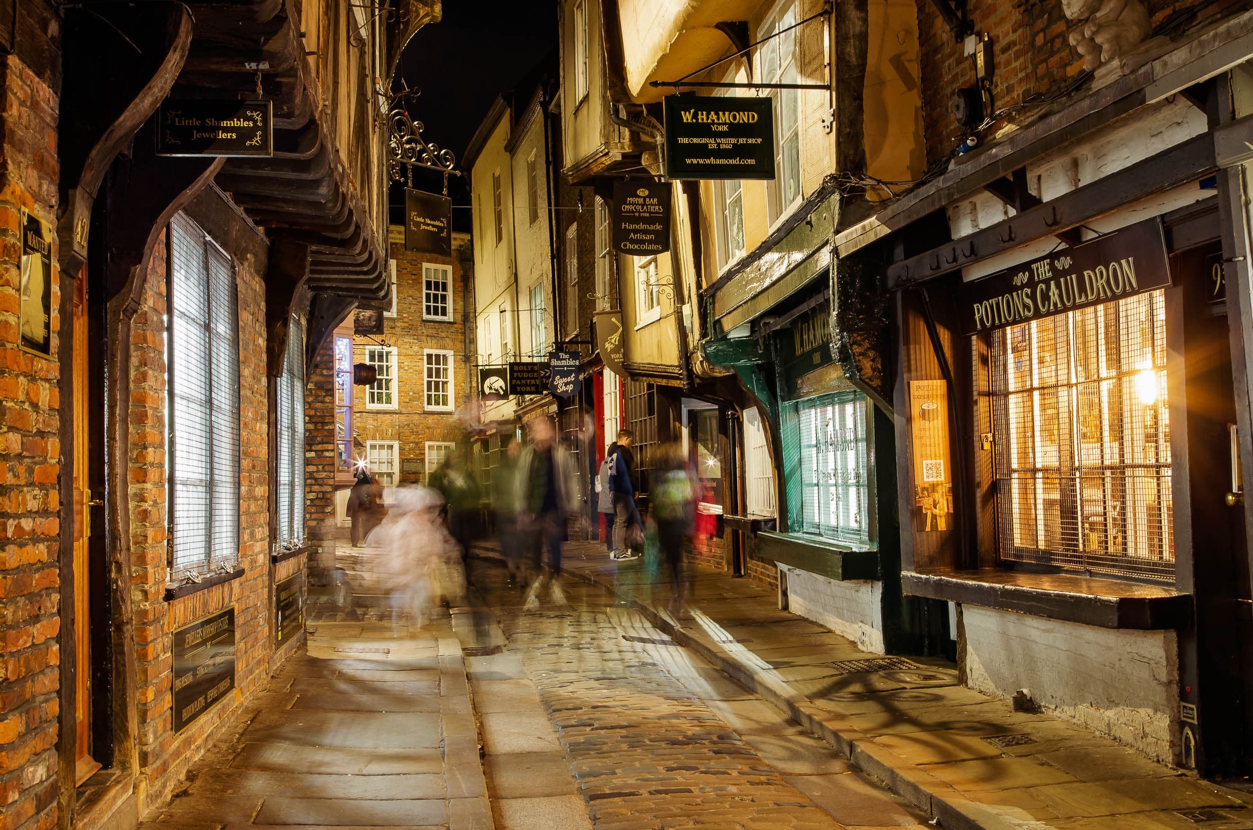 Evening Shambles street with blurred pedestrians, York photo walk