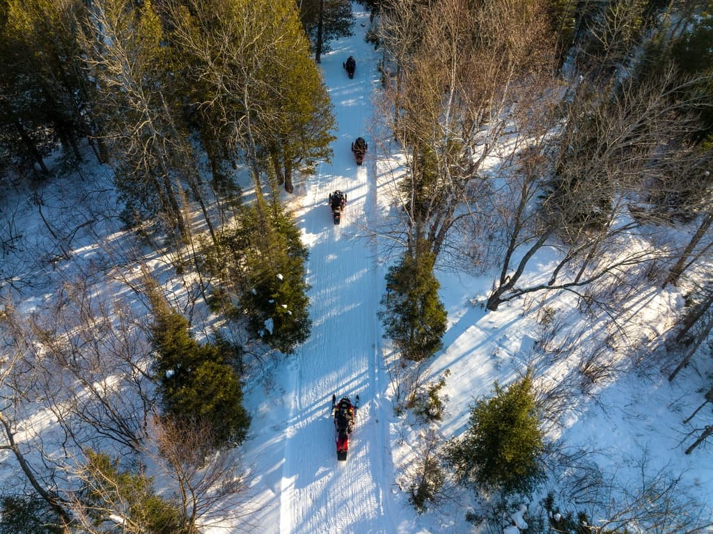 Full-Day Northwoods Snowmobile Adventure on the Frozen Timber Trail
