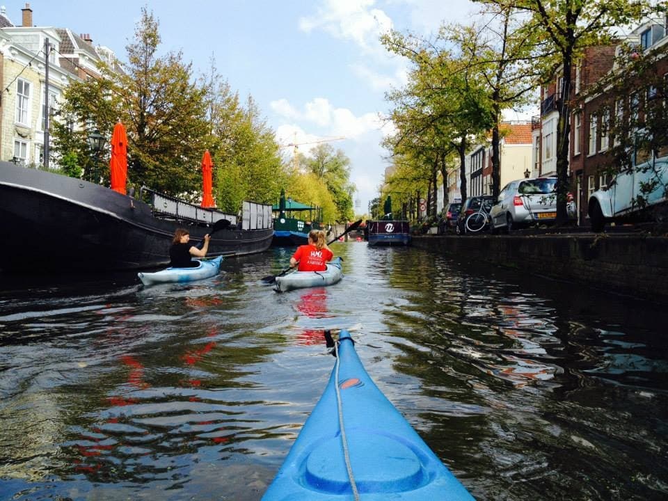 View from kayak in urban canal of The Hague