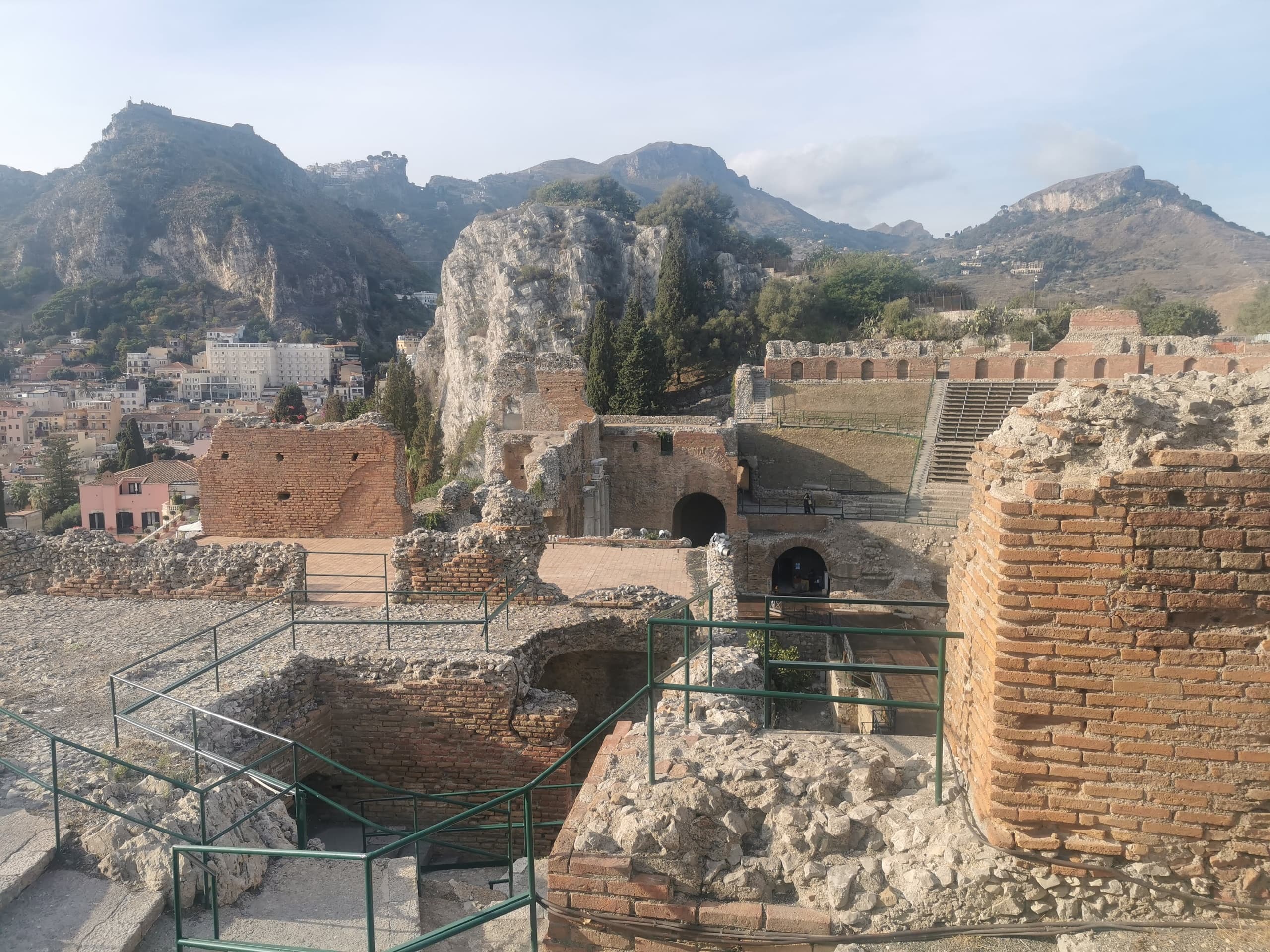Panoramic hilltop medieval ruins overlooking coastal Sicilian valley