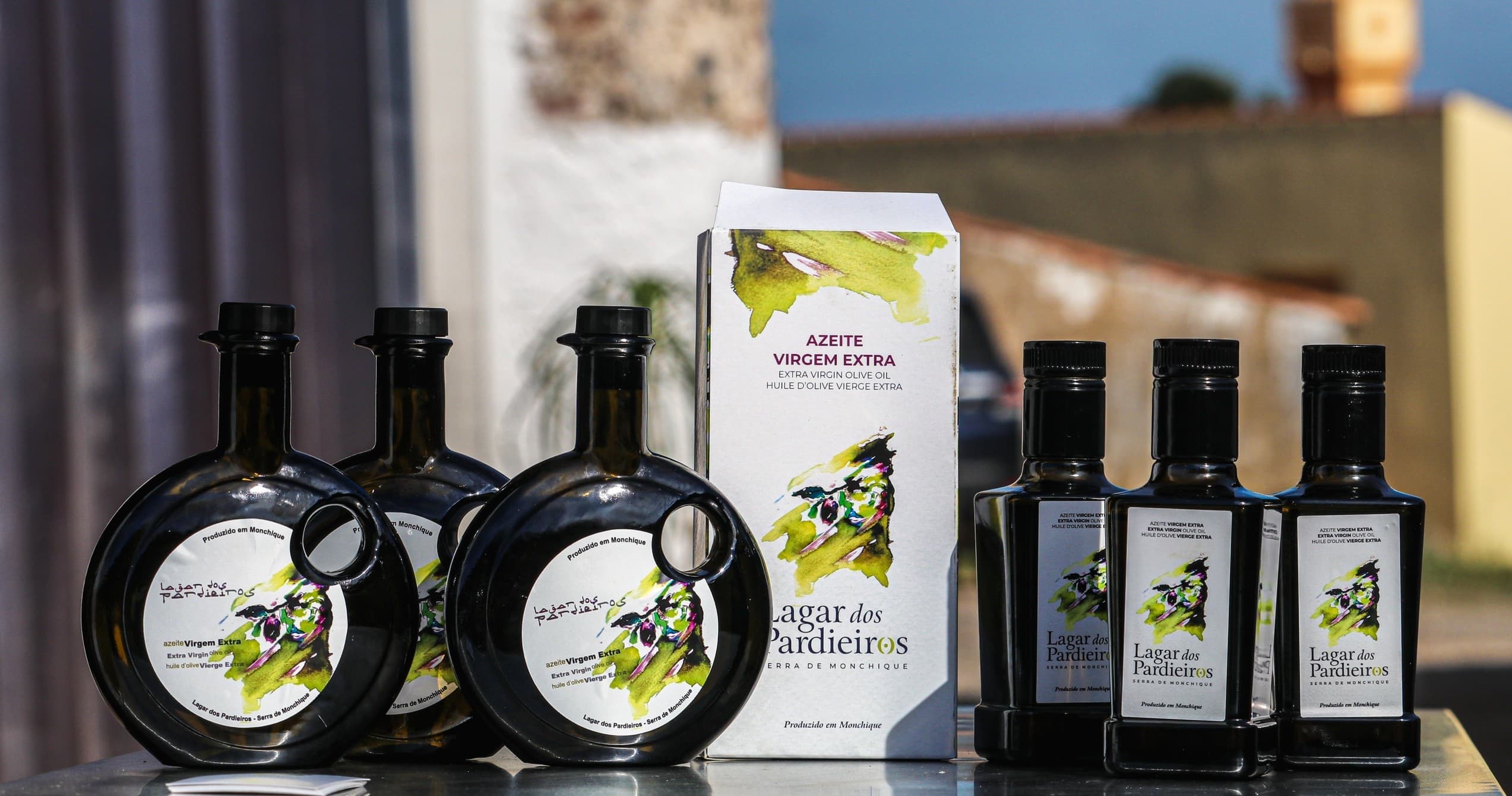 Bottles of artisanal olive oil displayed at farm shop