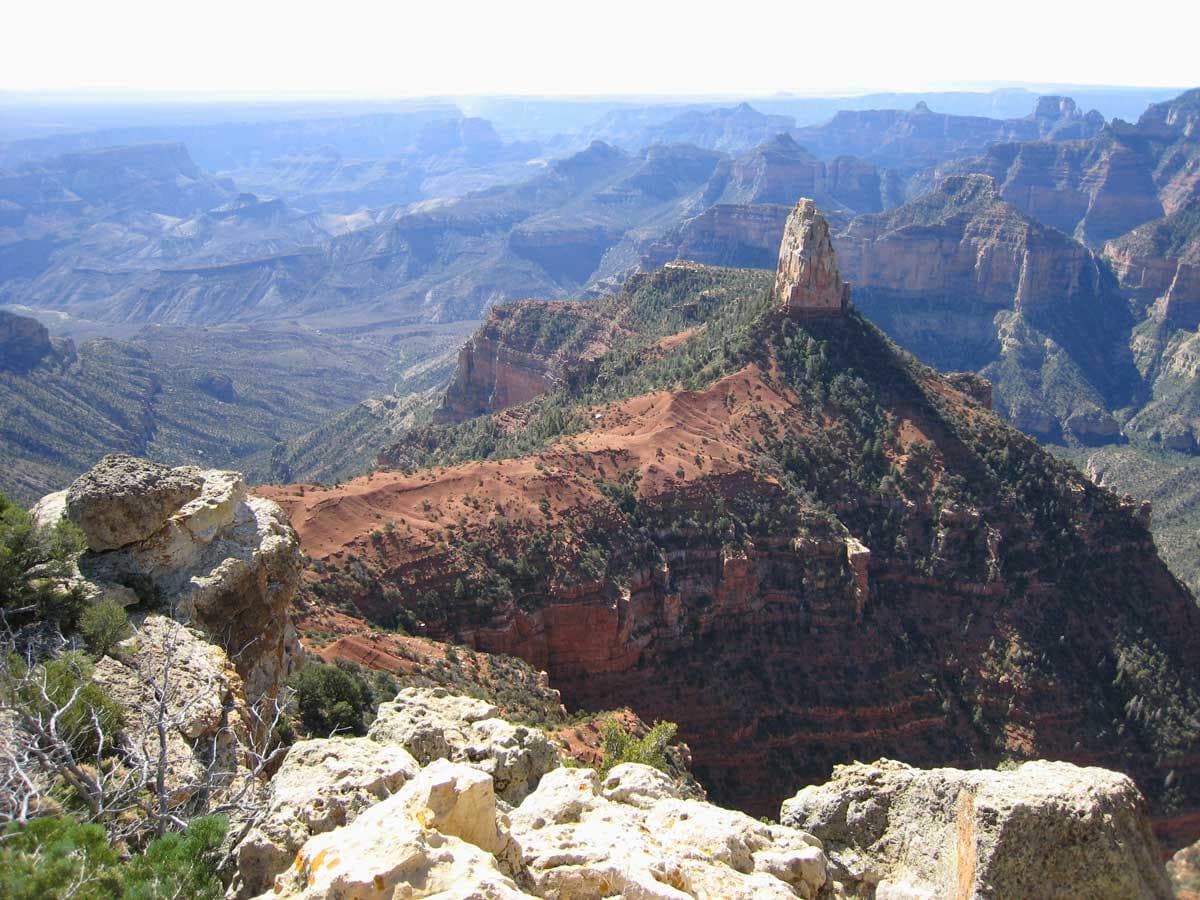 Panoramic canyon vista with hiking trails and rugged cliffs