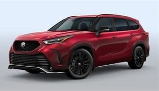 Premium red SUV in studio, clean composition for text overlay