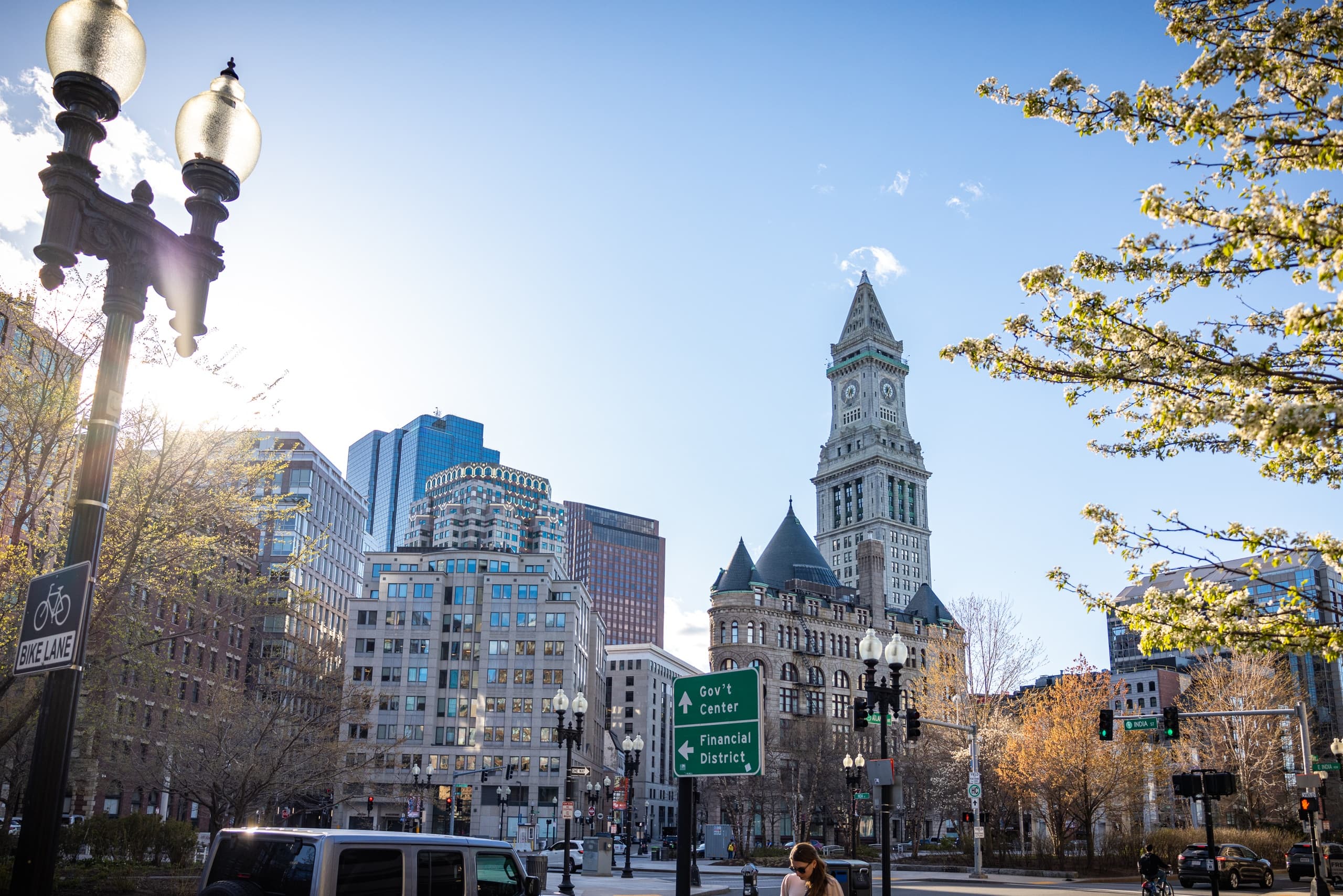 Boston downtown skyline with historic clock tower and trees