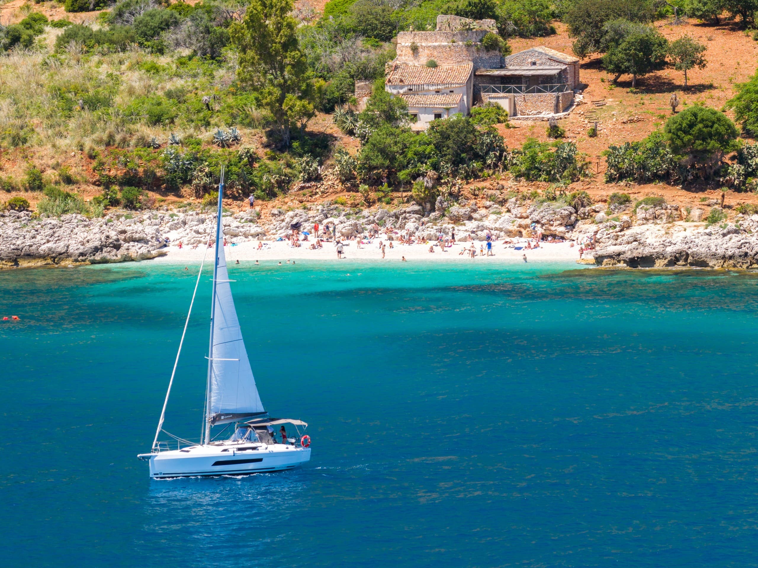Private Sail Past Scopello Faraglioni and Zingaro Reserve on a Dufour 37