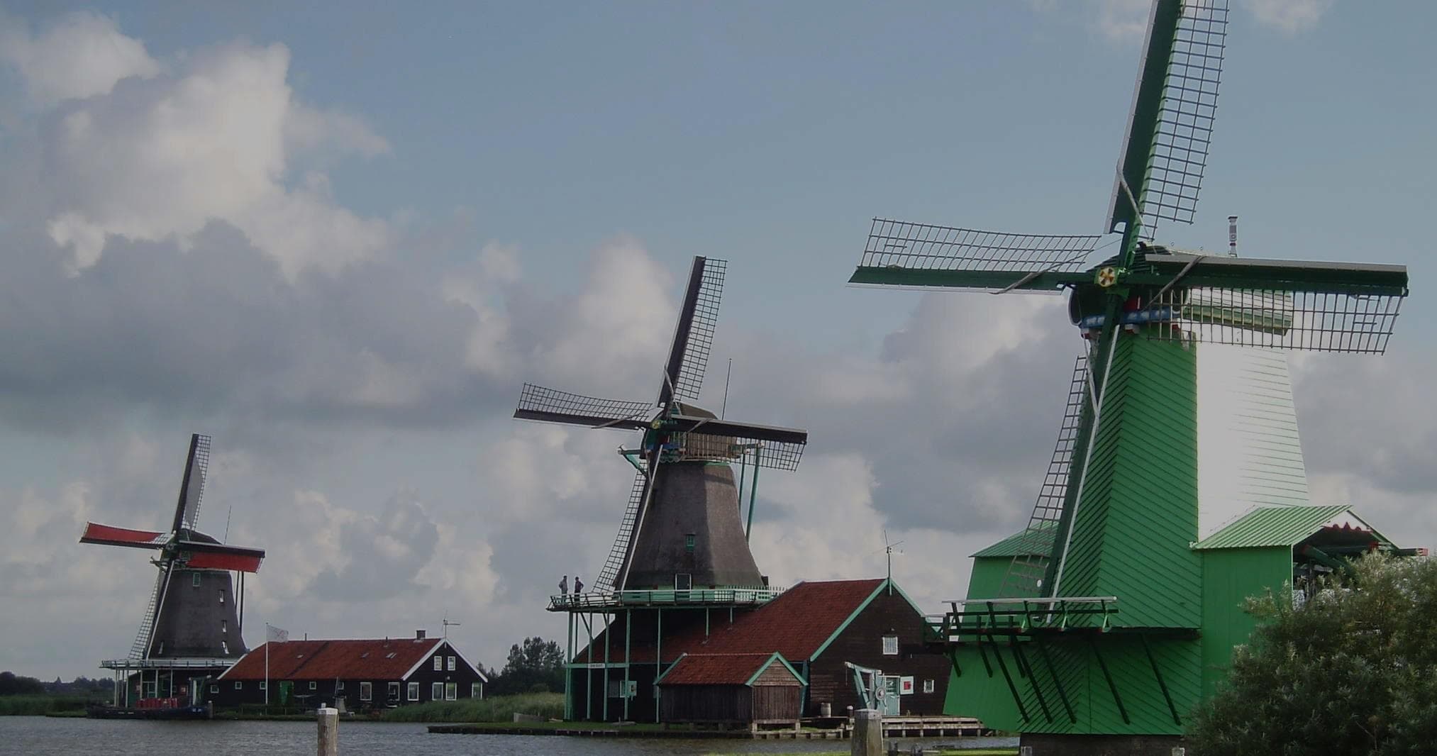 European street and canal panorama in Amsterdam, daytime walk