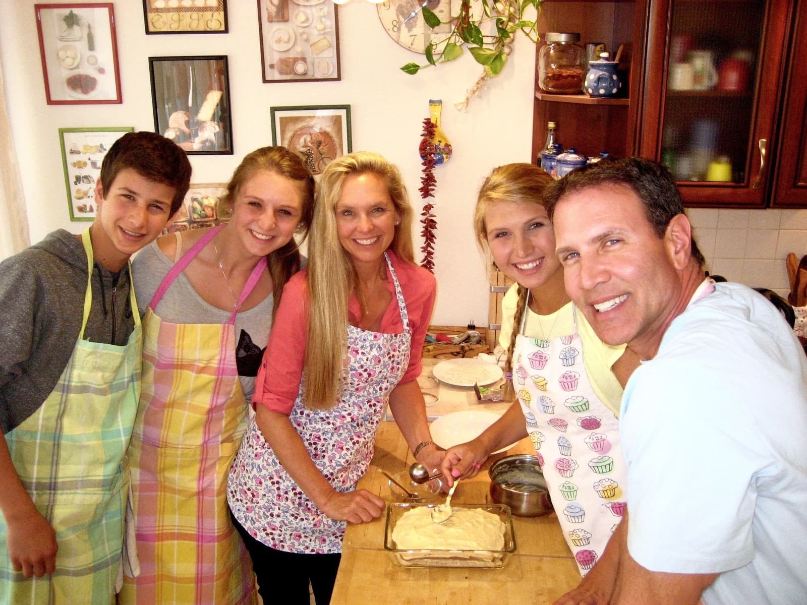 Group taking a hands-on Hungarian cooking class in Budapest kitchen