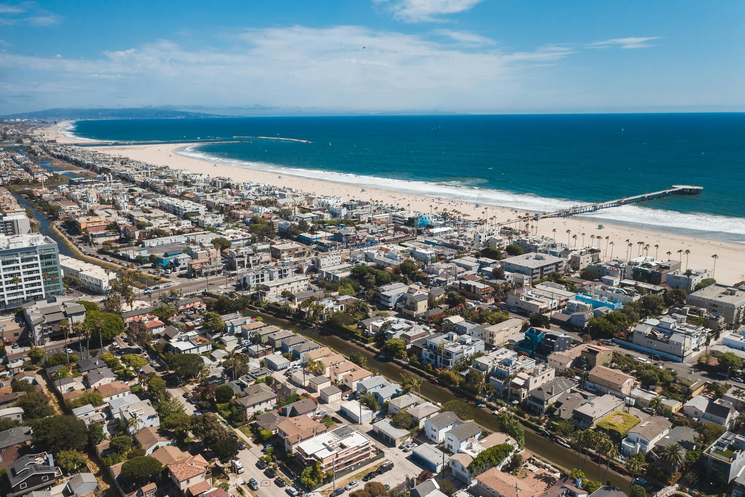 Aerial helicopter tour over Santa Monica coastline and beaches