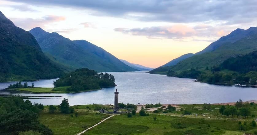 Panoramic view of Loch Shiel with Glenfinnan Monument at dusk
