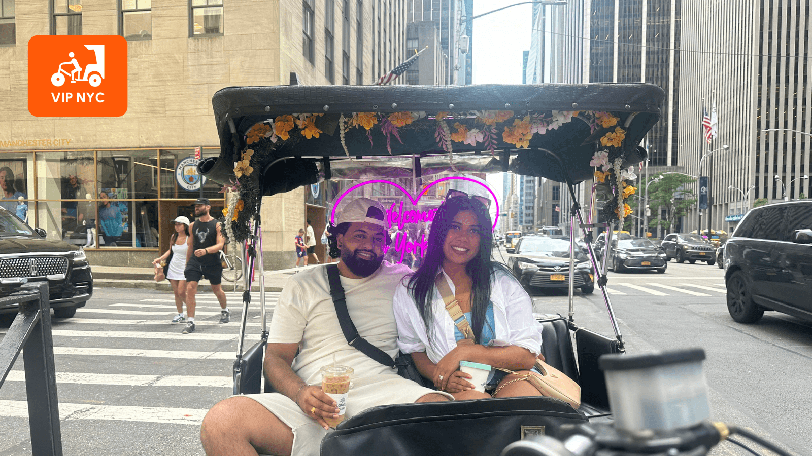 Pedicab ride with couple touring NYC streets near Midtown