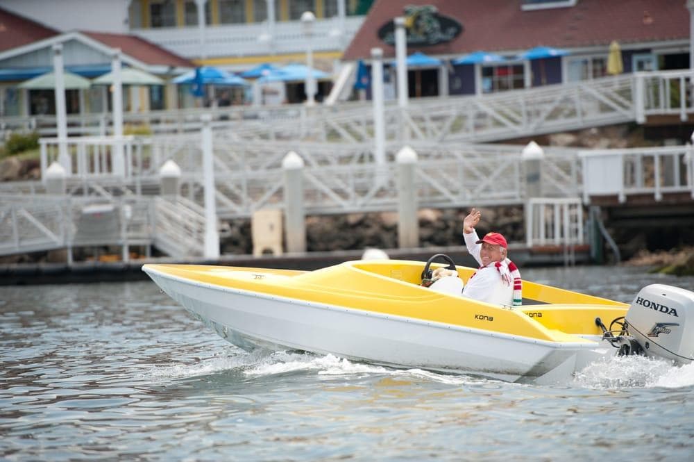 Yellow speedboat near marina, coastal sightseeing and fun