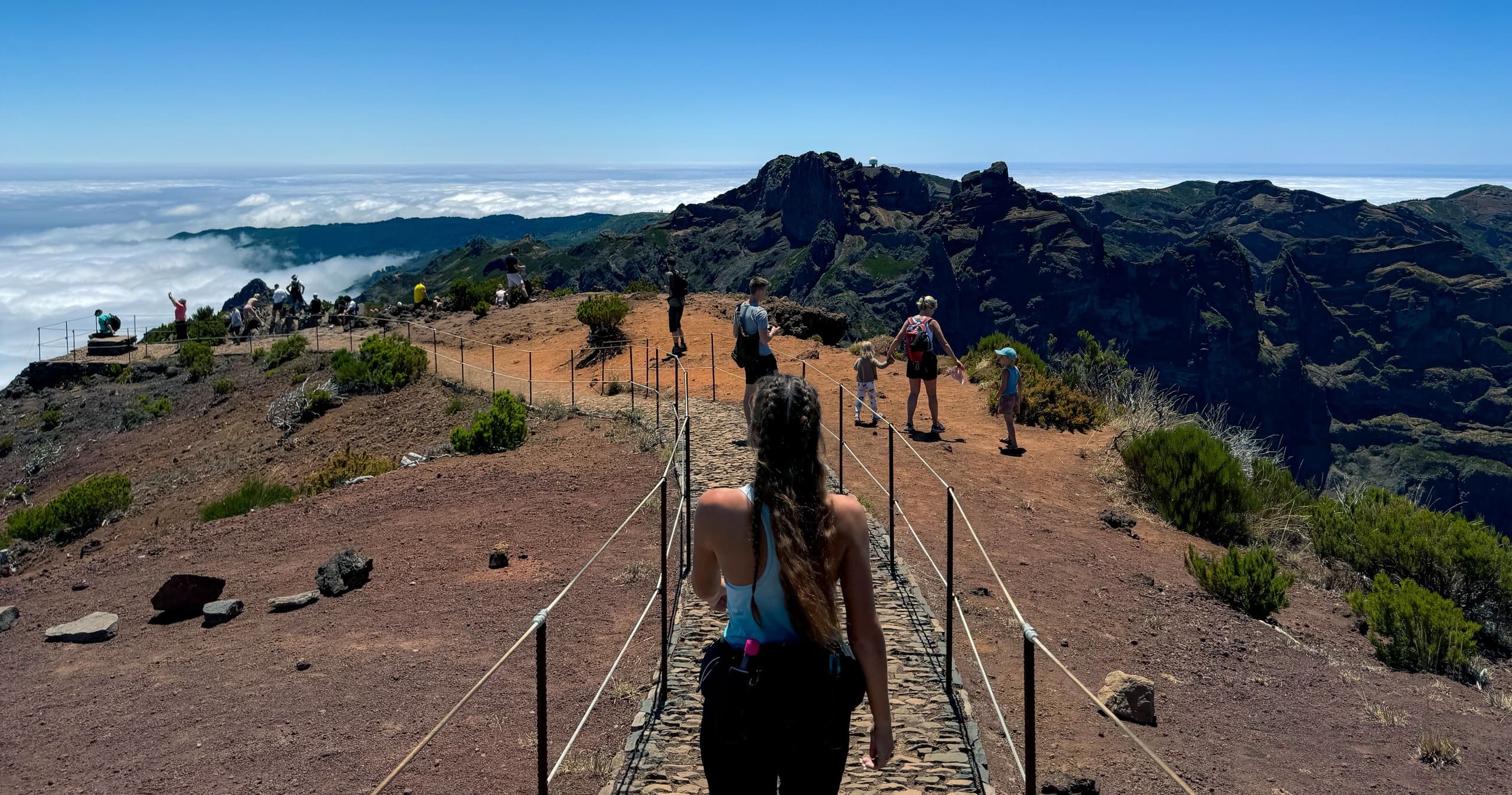 Volcanic ridge walkway with ocean views, panoramic Madeira trek