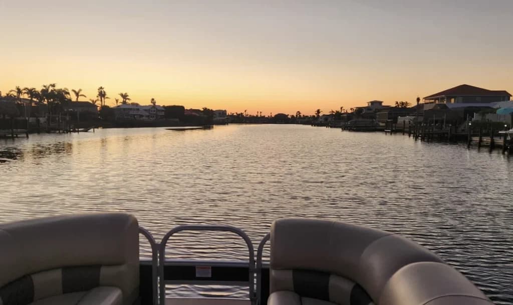 Canal Tour with Sun Island Boat & Home Services in Cape Coral