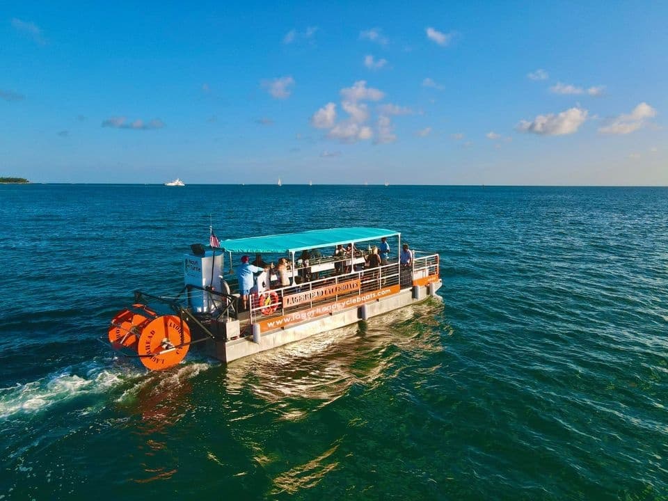 Tour boat cruising clear coastal waters near Fort Myers, Florida