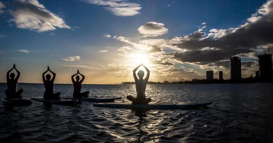 SUP Yoga in Honolulu: Balance and Bliss on the Water