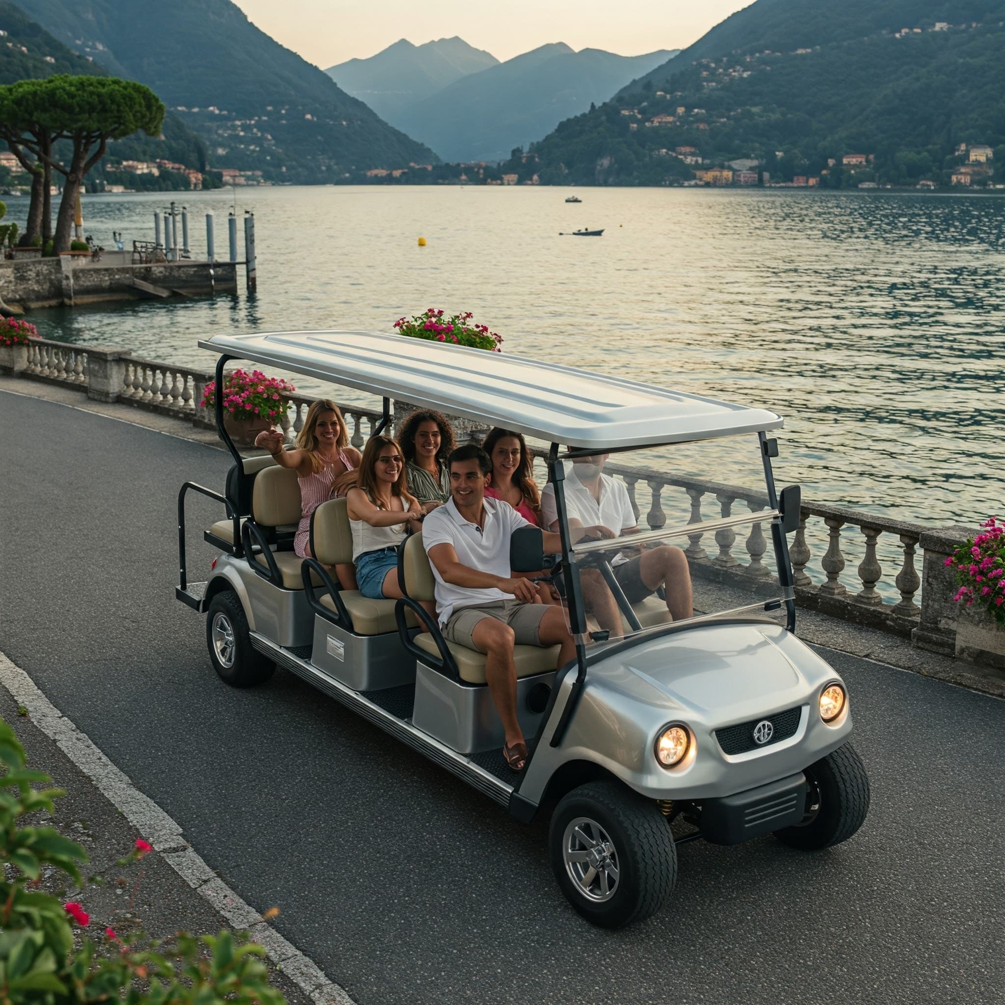 Group riding open-air tour cart past lakeside promenade at dawn
