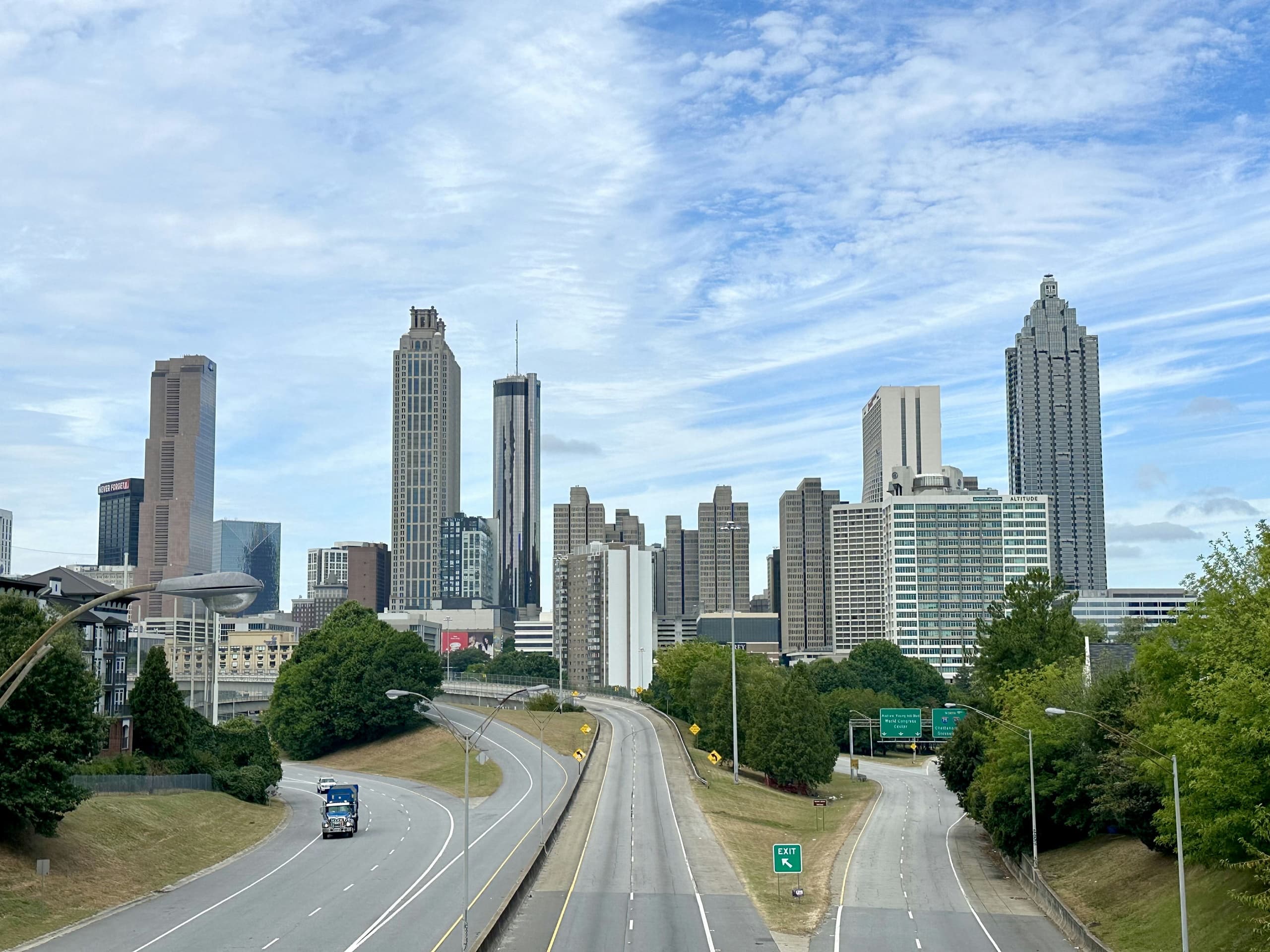 Downtown Atlanta skyline viewed from highway, urban city drive