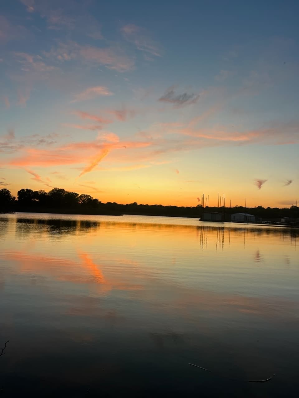 Sunset over Grapevine Lake marina, calm waters for kayaking