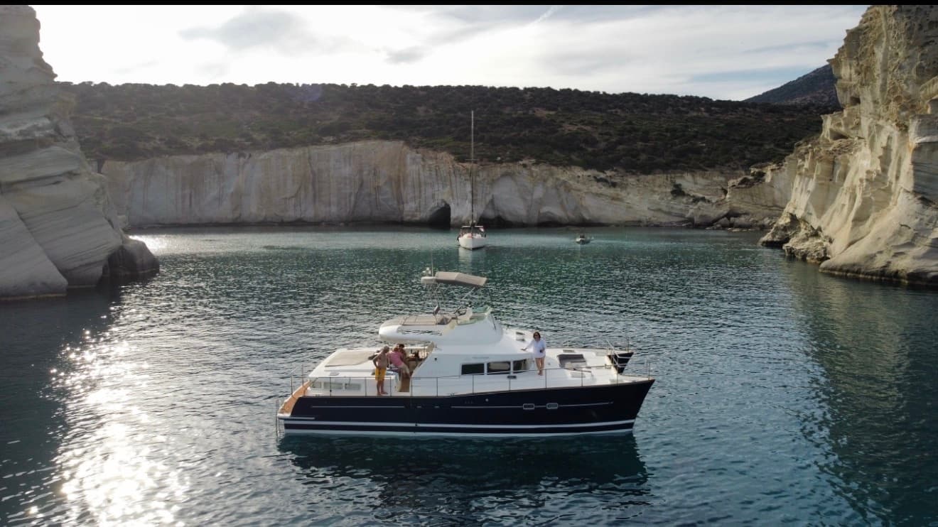 Sail Milos Southern Coast: Full-Day Private Catamaran to Kleftiko, Tsigrado & Thermal Springs
