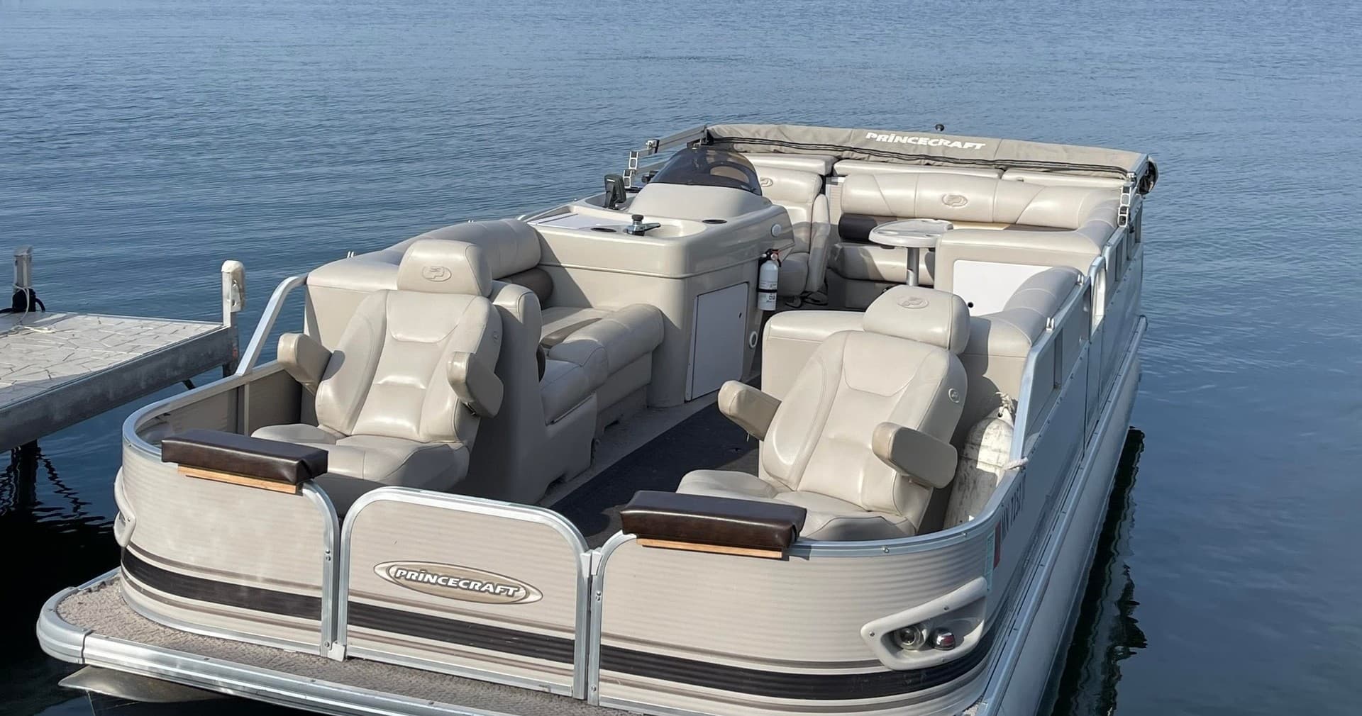 Bow view of luxury pontoon moored on Lake Carlos, MN