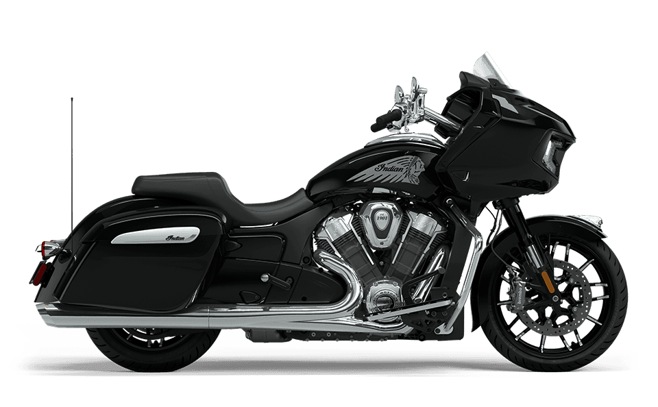 Black Indian touring motorcycle, side profile on white studio backdrop