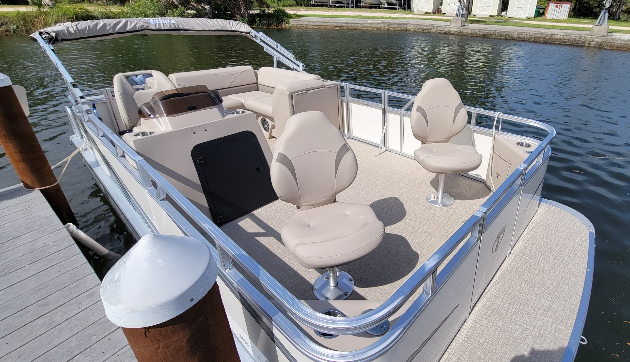 Pontoon bow and seating at dock showcasing boat adventure