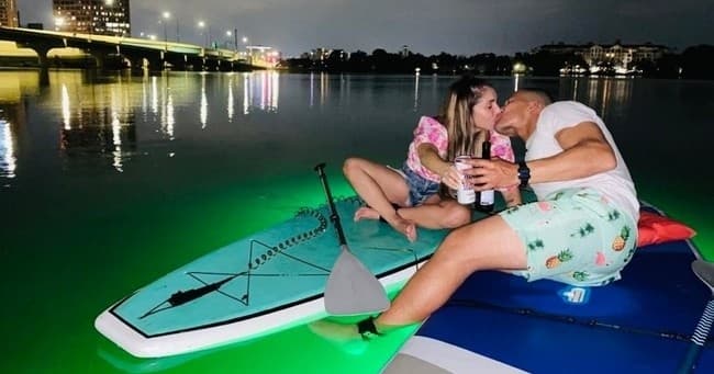 Experience Orlando’s Magical Neon Glow Kayak & Paddleboard Date Night on Lake Ivanhoe