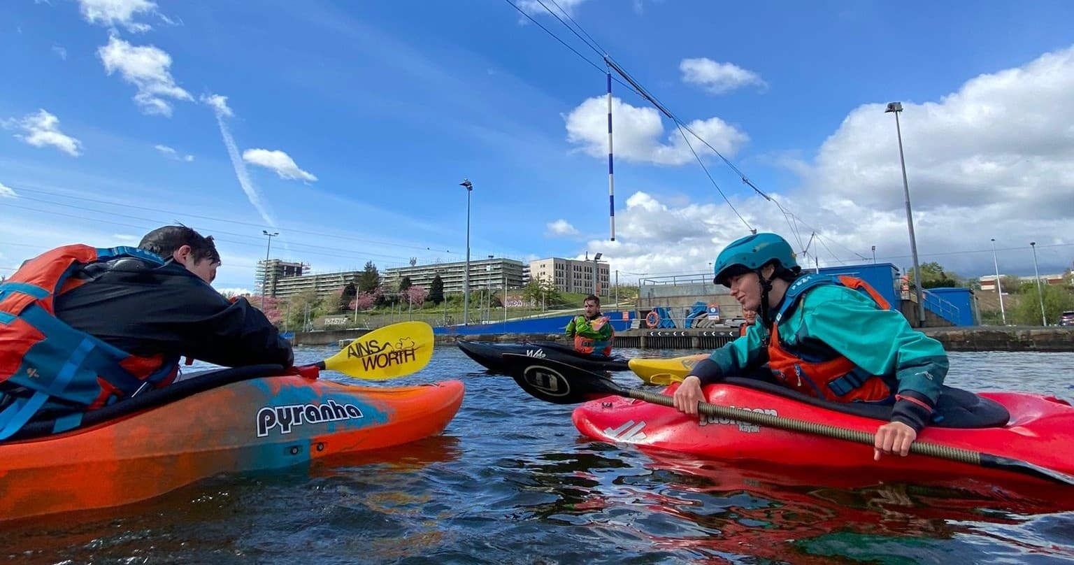 Pairs of kayakers paddling in calm channel at Pinkston canal