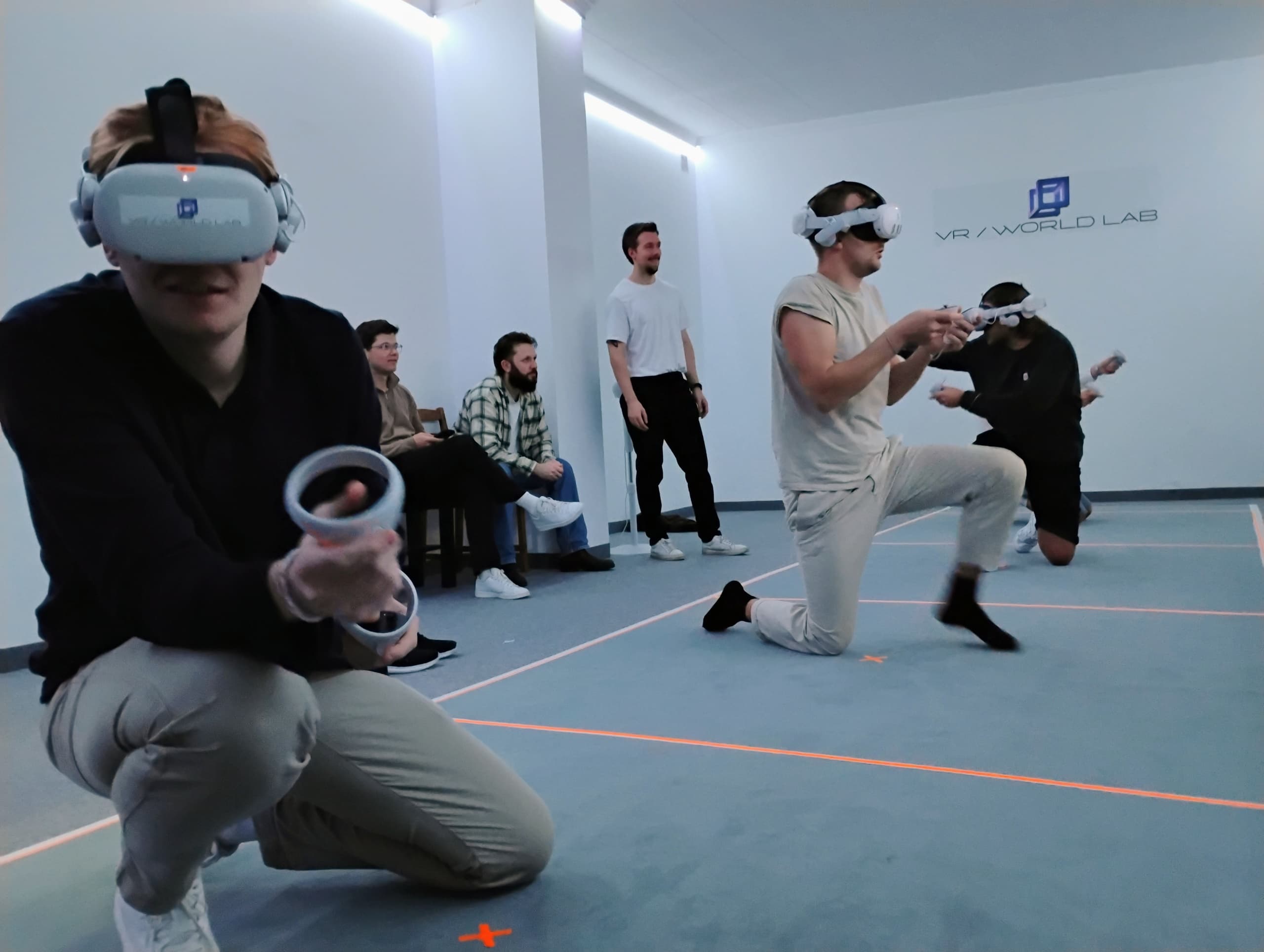Players using standalone VR headsets during indoor gaming session