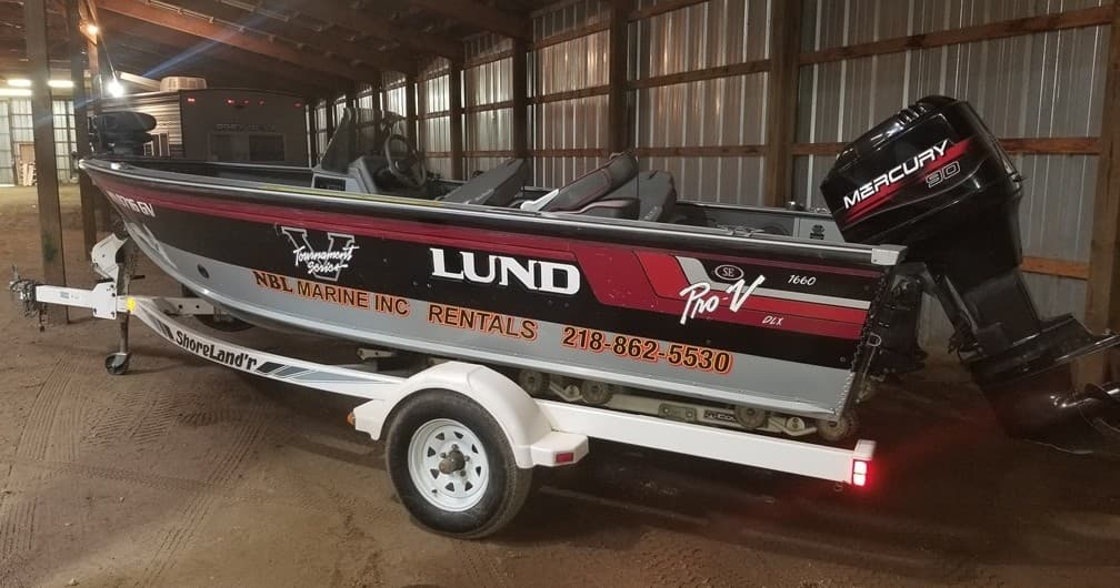 Boat Fishing Adventures with Enclave Dock and Lift in Battle Lake
