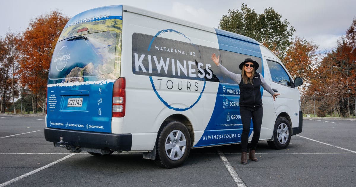 Small tour van parked for guided wine and scenic day tours