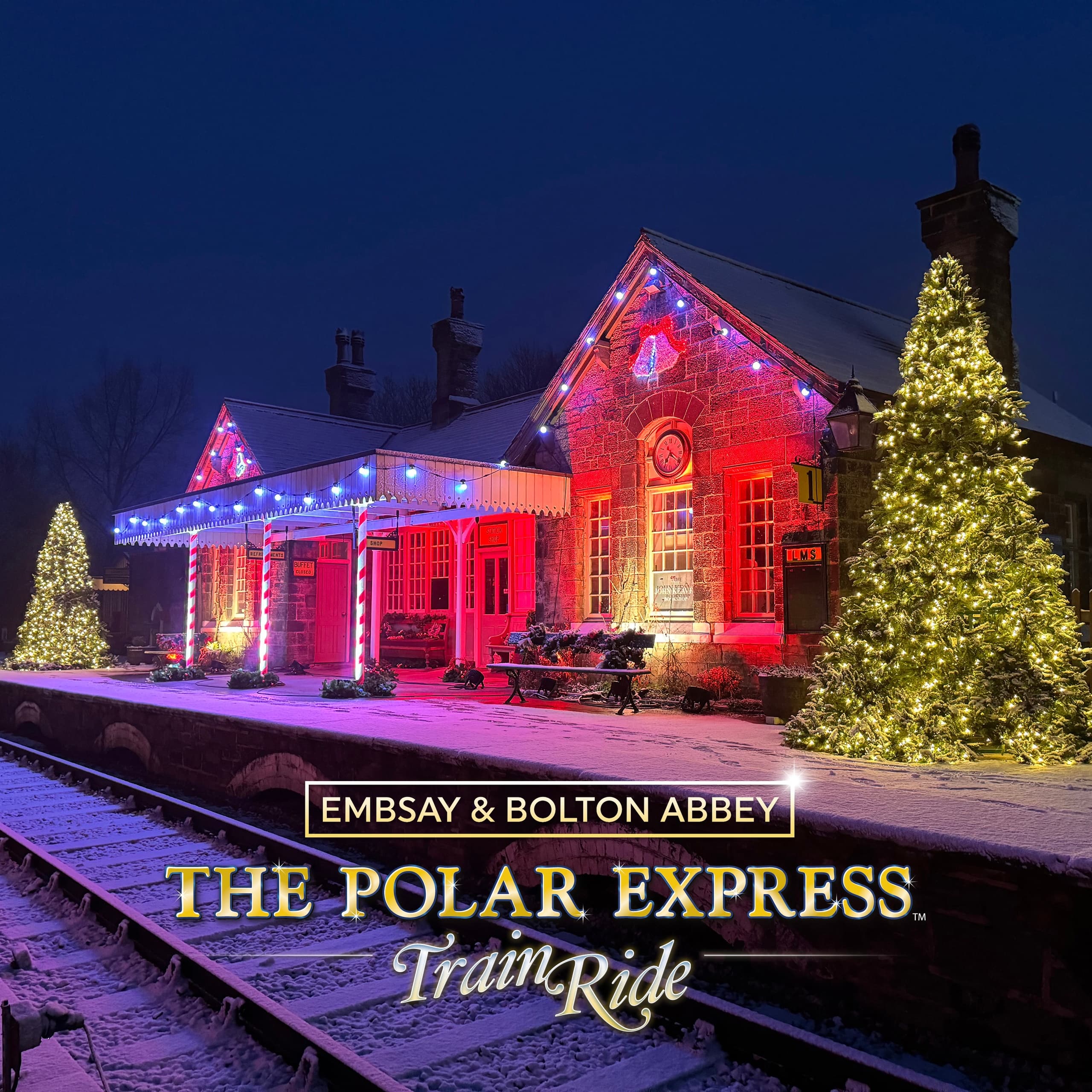 Embsay station illuminated at night for Polar Express train ride